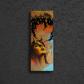Artistic depiction of a figure with horns on a textured wall