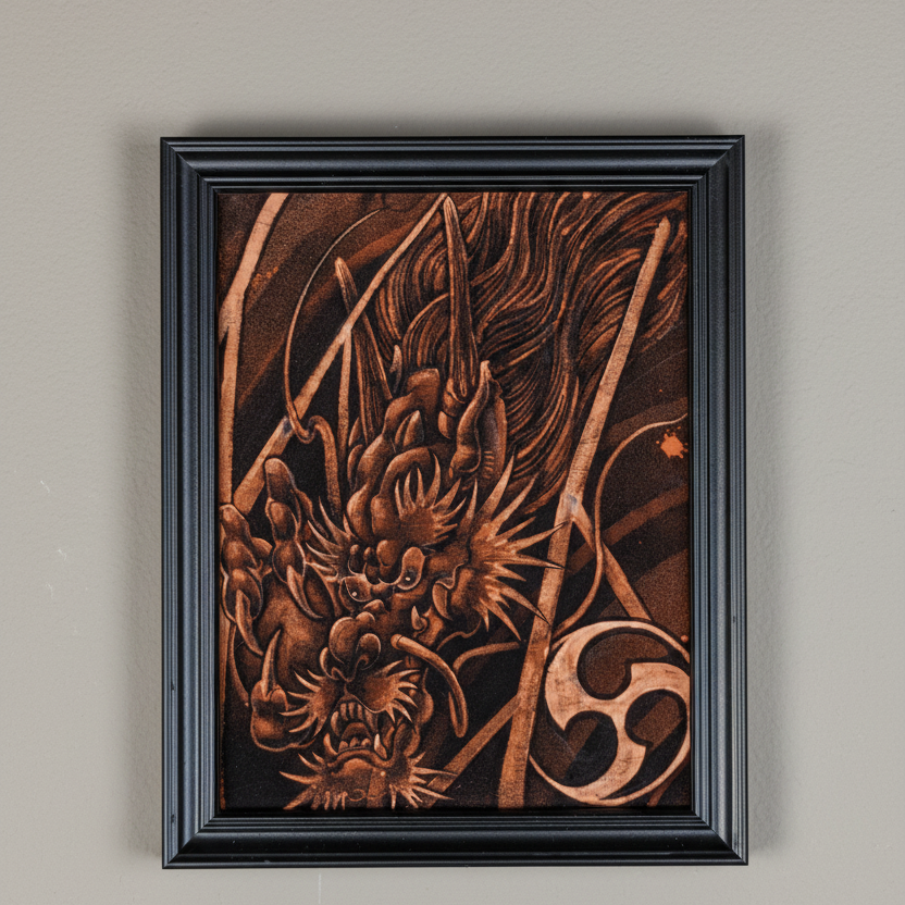 Framed artwork of a dragon design on a beige wall