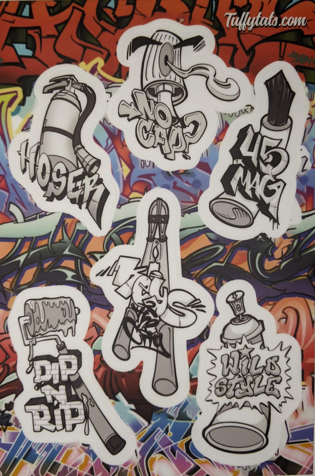 A set of six graffiti-themed stickers by Horus, featuring stylized illustrations of spray cans, a paint roller, and a fire extinguisher with urban slang tags like "No Cap" and "Wild Style."