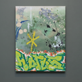 Abstract art piece with splashes of color on a gray background