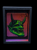 Green hannya mask design on a colorful background with a black frame.