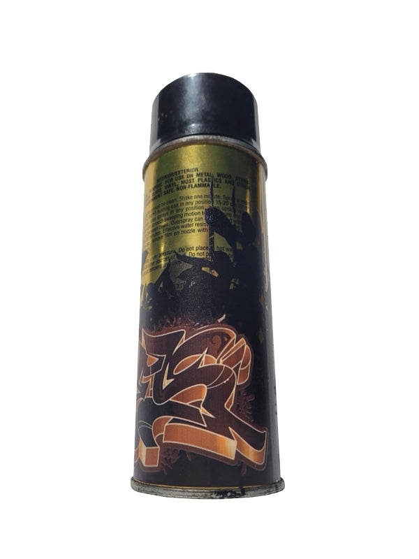 Aerosol can with black and gold design on a white background