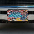 Colorful license plate with graphic design on a vehicle