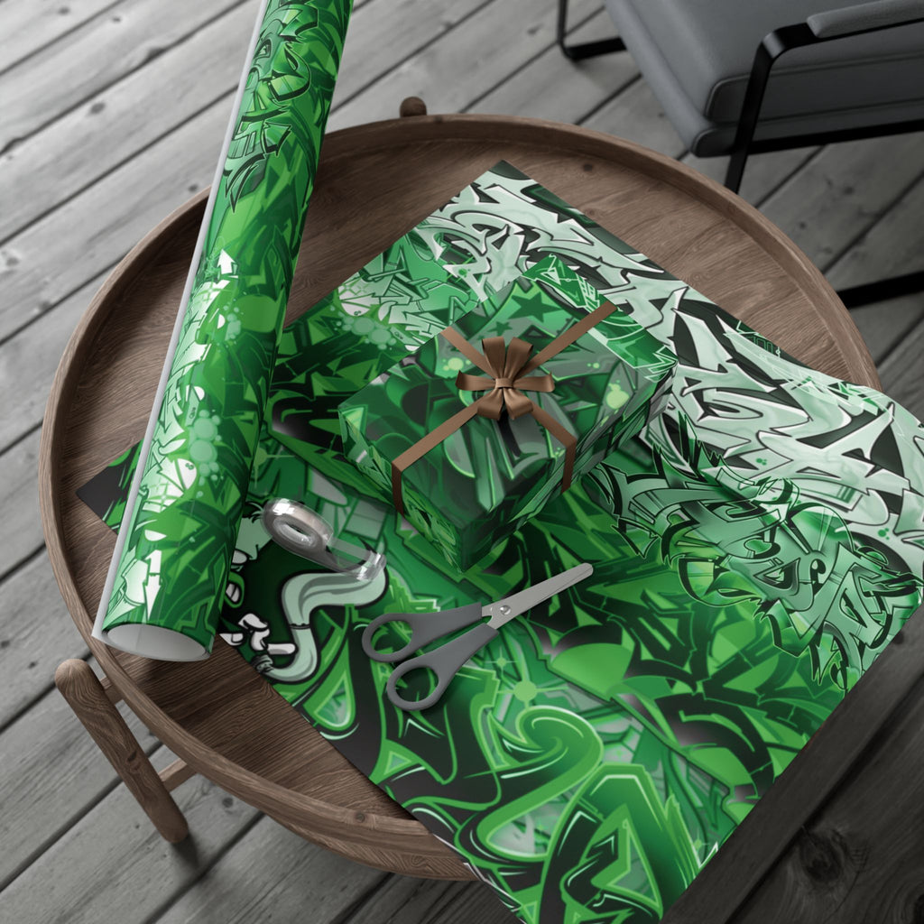 Green patterned gift wrap with scissors on a wooden table