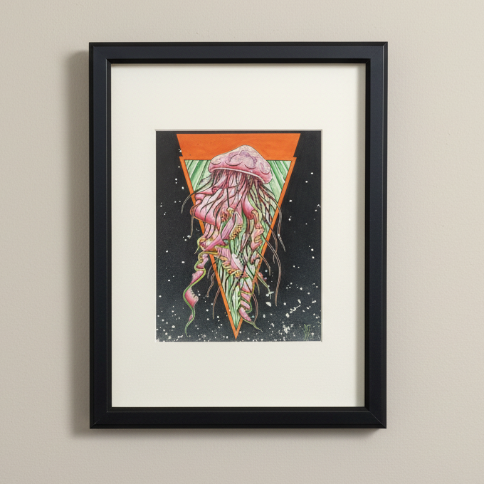 Framed artwork of a jellyfish design on a beige wall
