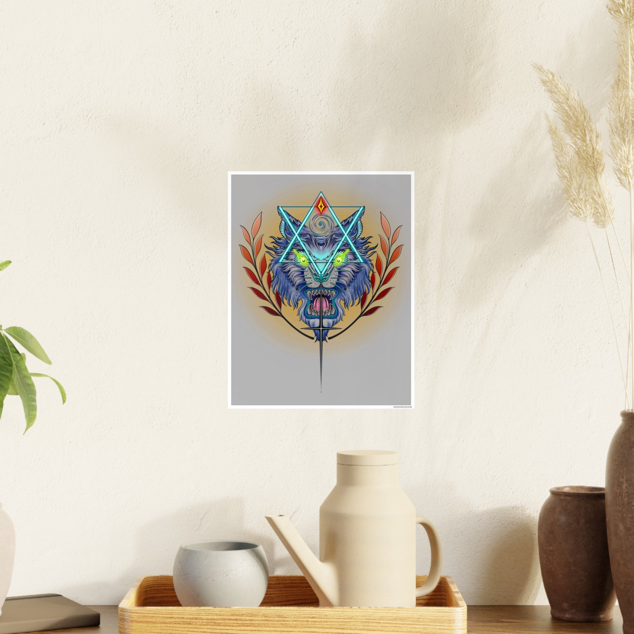 Framed artwork of a colorful wolf head with geometric design on a wall above a wooden shelf with decorative items.