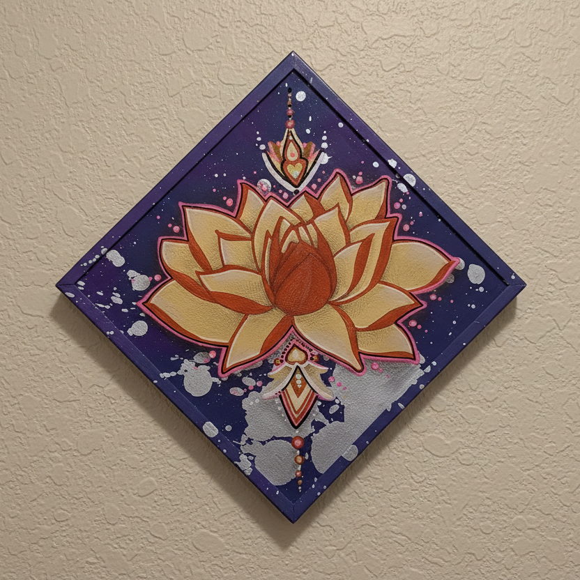 Decorative wall art with a lotus flower design on a beige wall.